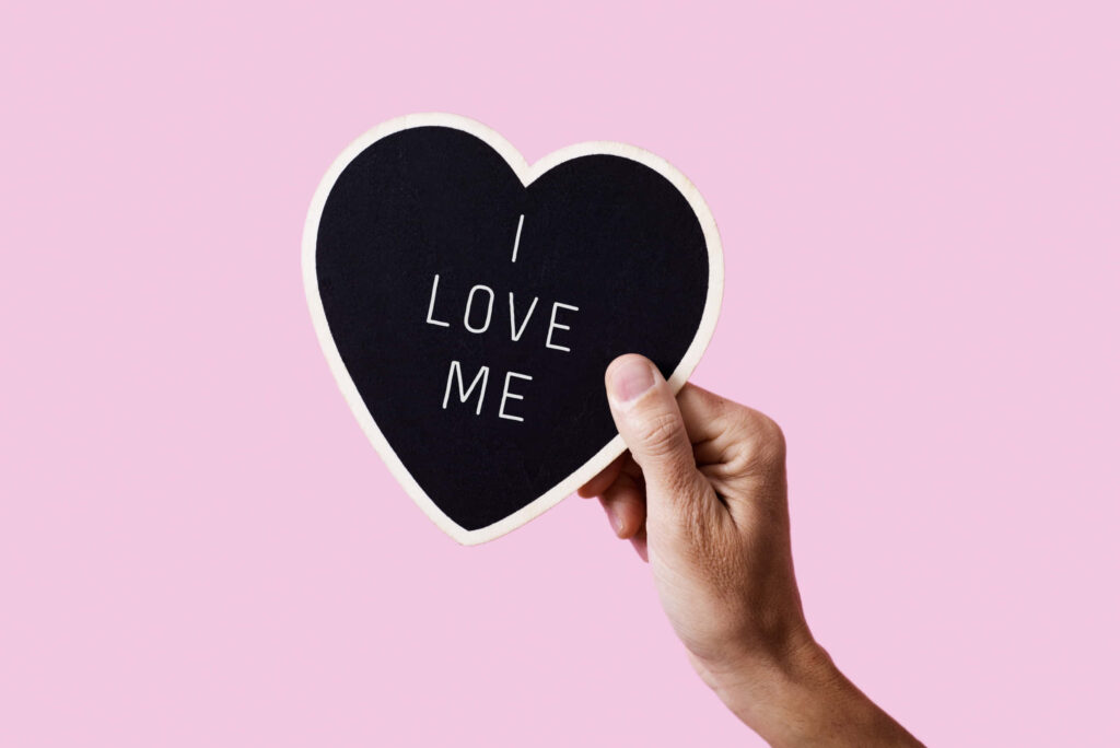 Minimalist Valentine’s Day Wallpaper: Heart Sign on Pink Background