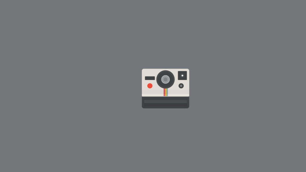 Minimalist Vintage Camera Wallpaper on Solid Grey Background
