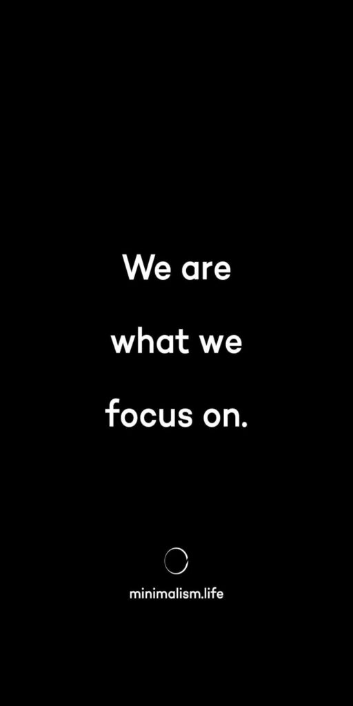 Minimalist Black Wallpaper: 'We Are What We Focus On' Design
