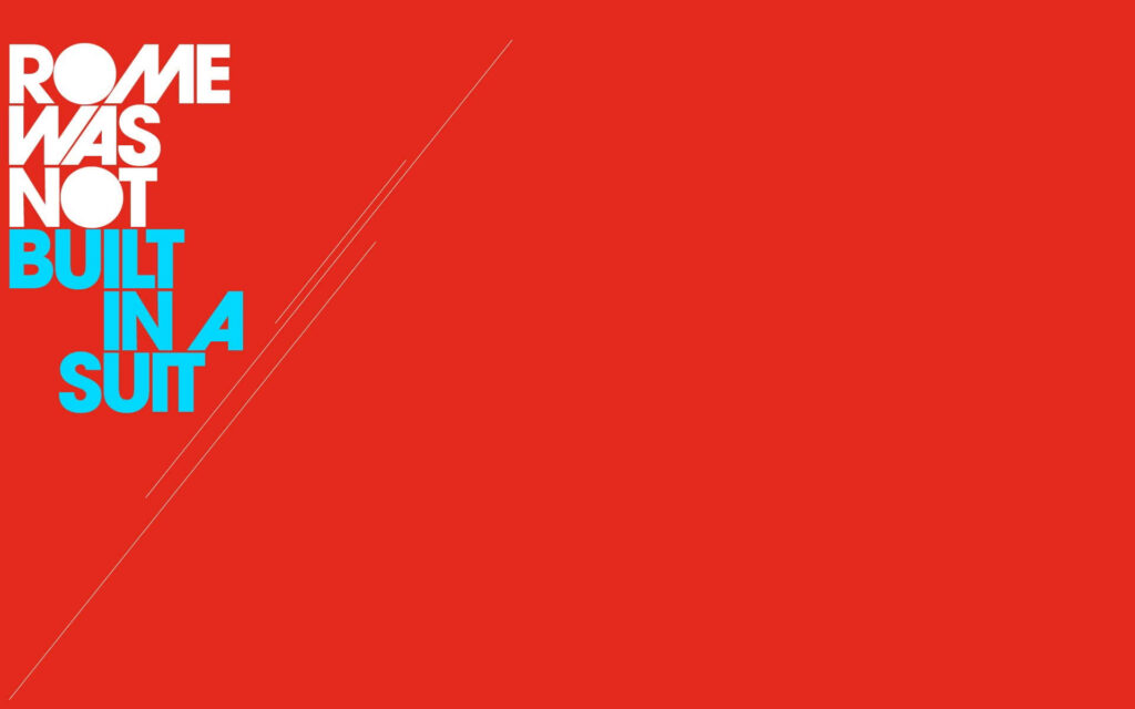 Minimalist Red Wallpaper: Quote 'Rome Was Not Built in a Suit'
