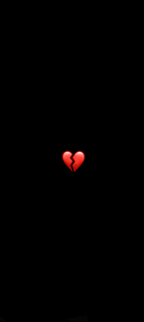 Minimalist Wallpaper: Broken Red Heart on Black Background