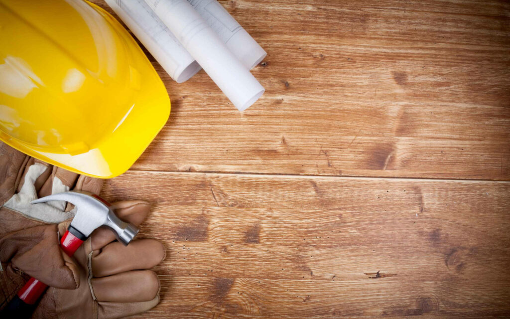 Minimalist Civil Engineering Wallpaper: Tools on Wooden Surface