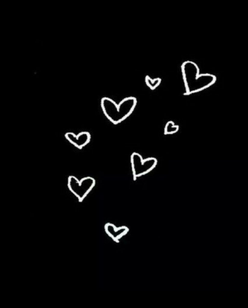 Elegant Minimalist Wallpaper: White Hearts on Black Background