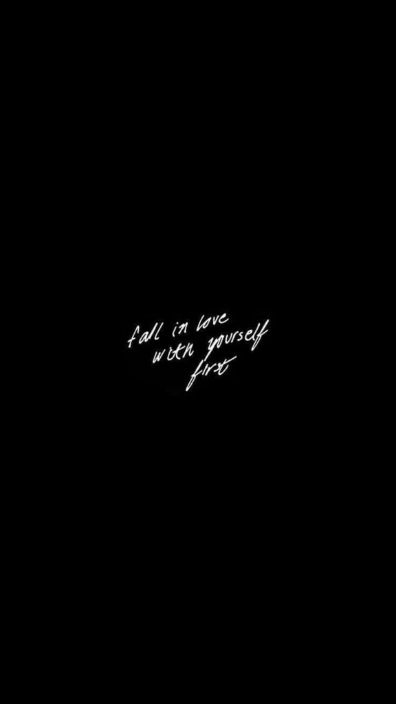 Minimalist Wallpaper: 'Fall in Love with Yourself' on Black Background