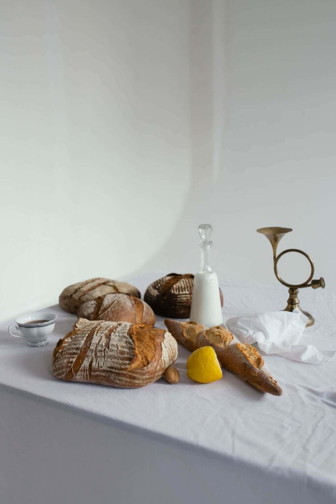 Cozy Rustic Wallpaper: Fresh Pastries & Coffee on Tablecloth