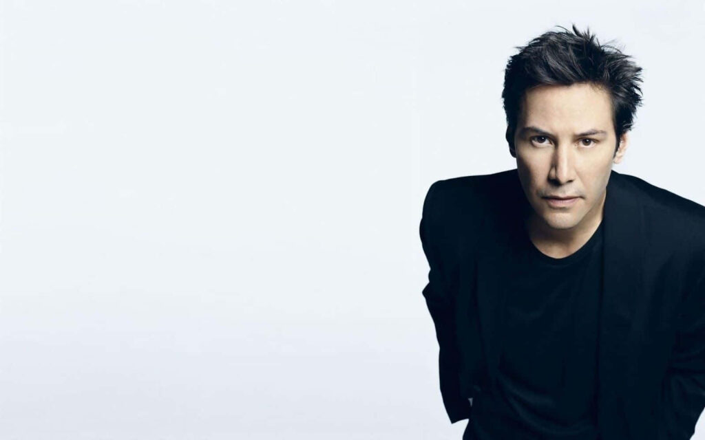 Minimalist Keanu Reeves Wallpaper: Charm & Sophistication in Black