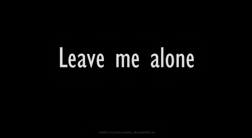 Minimalist Black Wallpaper: 'Leave Me Alone' Bold Text Design