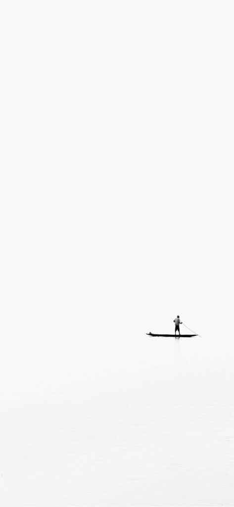 Minimalist Scene: Lone Rowing Boat Against Tranquil White Background Wallpaper