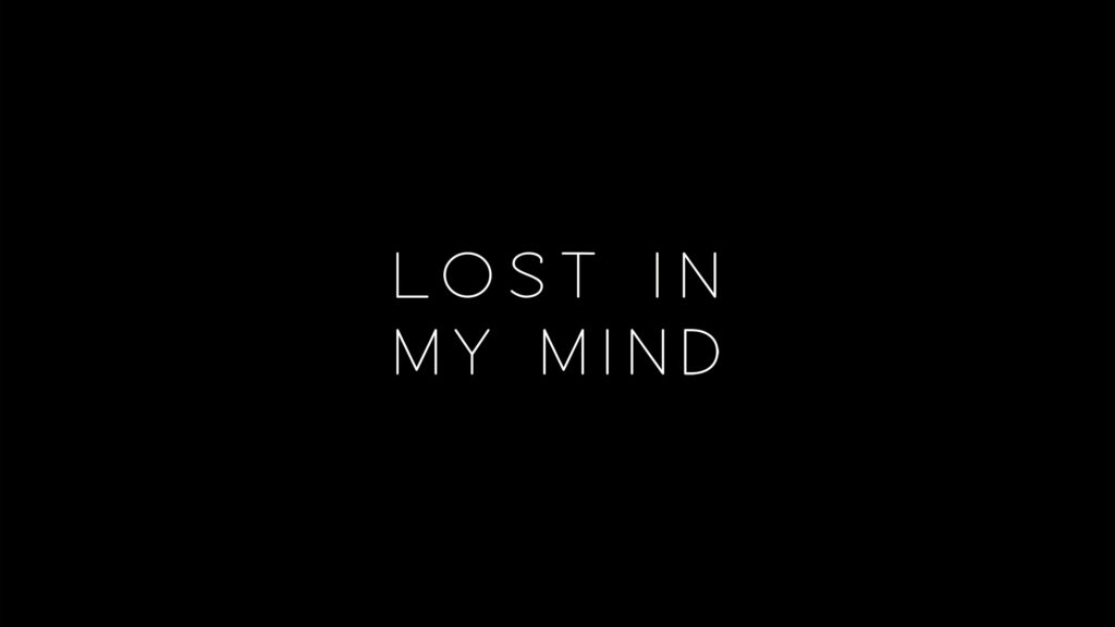 Minimalist Wallpaper: 'Lost In My Mind' on Black Background