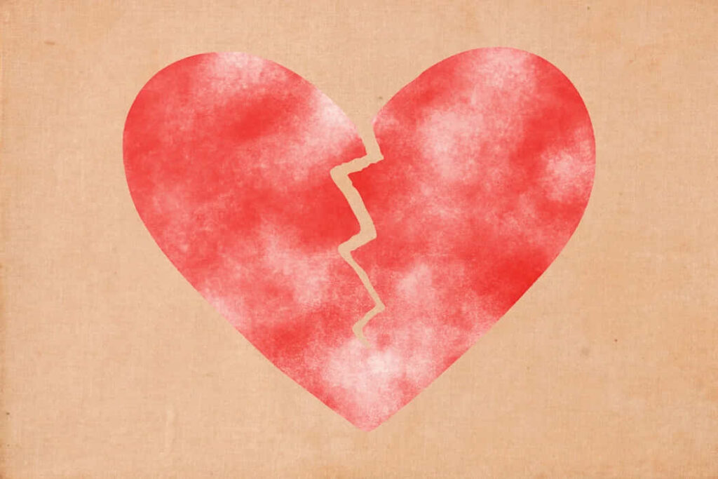 Minimalist Red Broken Heart Wallpaper on Brown Textured Background