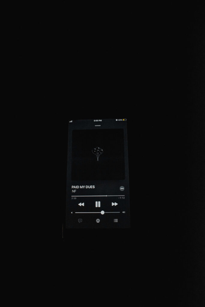 Minimalist Wallpaper: Dark Smartphone Music Interface - Paid My Dues
