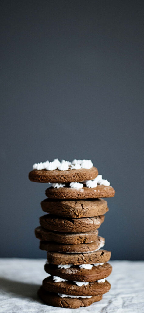 Minimalist iPhone Wallpaper: Chocolate Cookies with Frosting on Gray