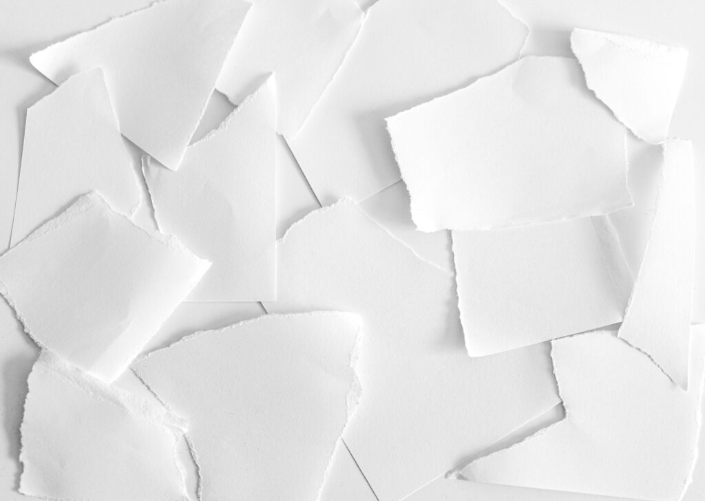 Minimalist Wallpaper: Textured White Paper Pieces Background