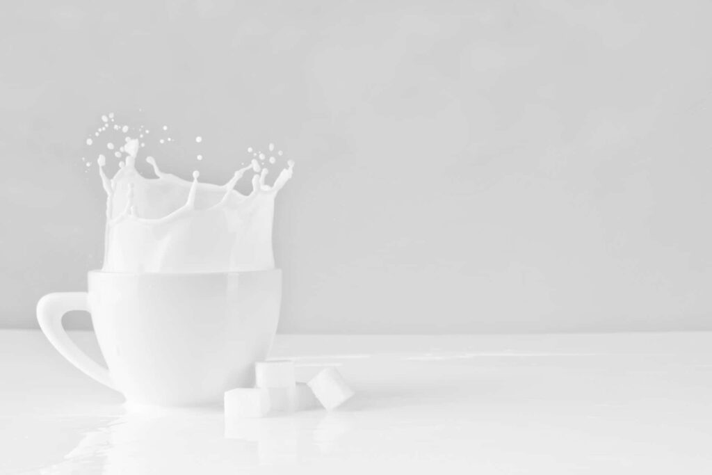 Elegant Minimalist Wallpaper: White Milk Splash on Smooth Background