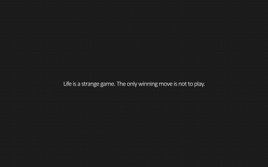 Minimalist WarGames wallpaper with iconic quote white text on dark charcoal grid background