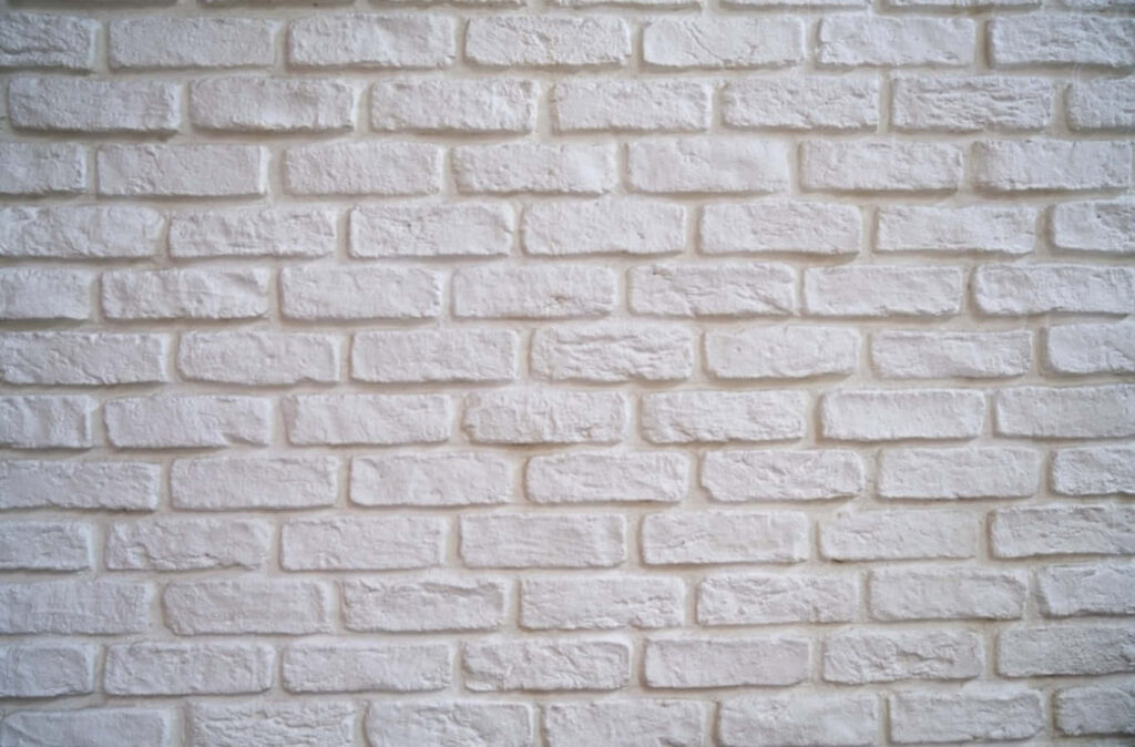 Minimalist White Brick Texture Wallpaper Background for Modern Spaces