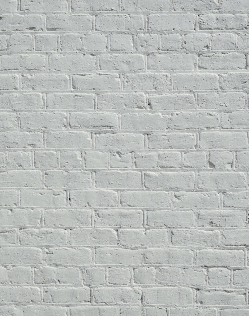 Minimalist White Brick Wall Wallpaper: Textured Background Design