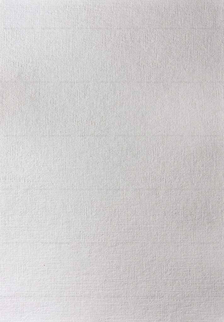 Minimalist white wallpaper with fine grain texture resembling canvas for modern clean desktop background