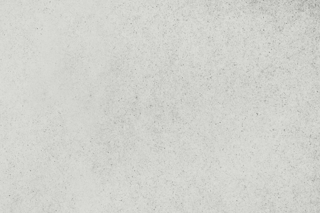 Plain White Concrete Texture Wallpaper with Subtle Speckles