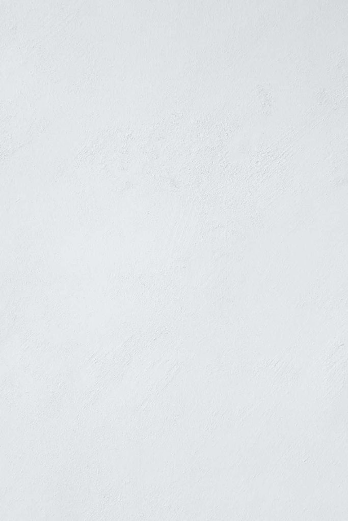 Blank white paper background with subtle matte texture for minimalist modern wallpaper design