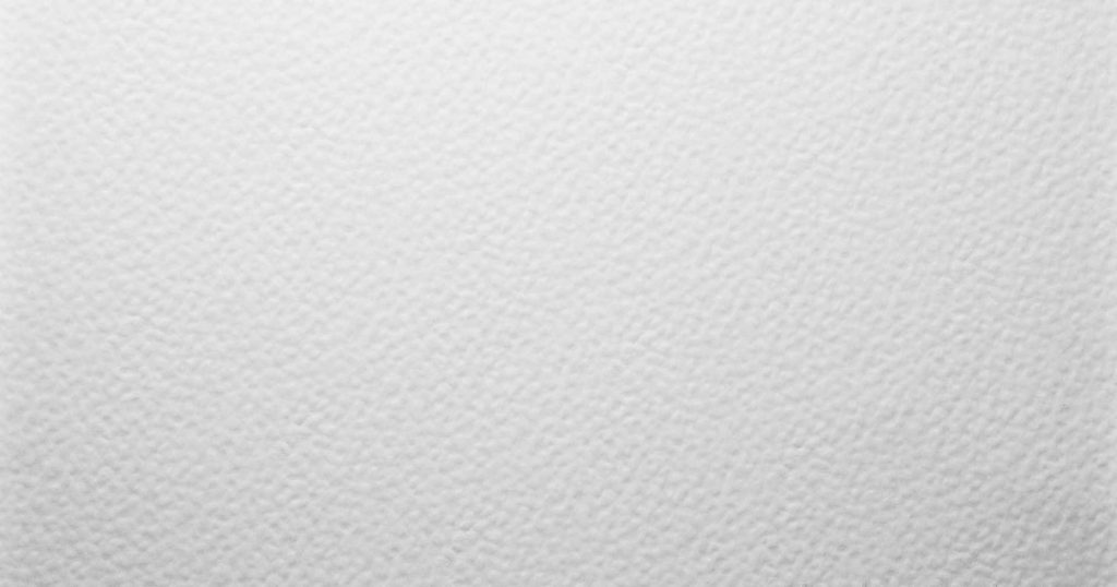 Minimalist white paper wallpaper with detailed granular texture and subtle watercolor grain