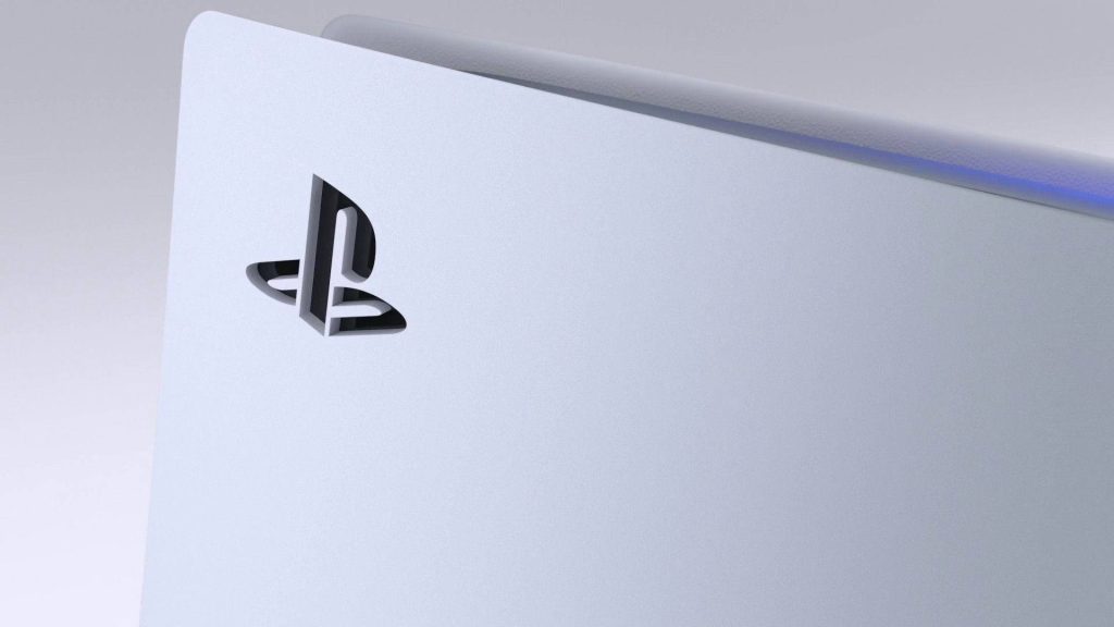 Close-up of white Sony PlayStation 5 console with glossy black logo and blue accent lighting wallpaper