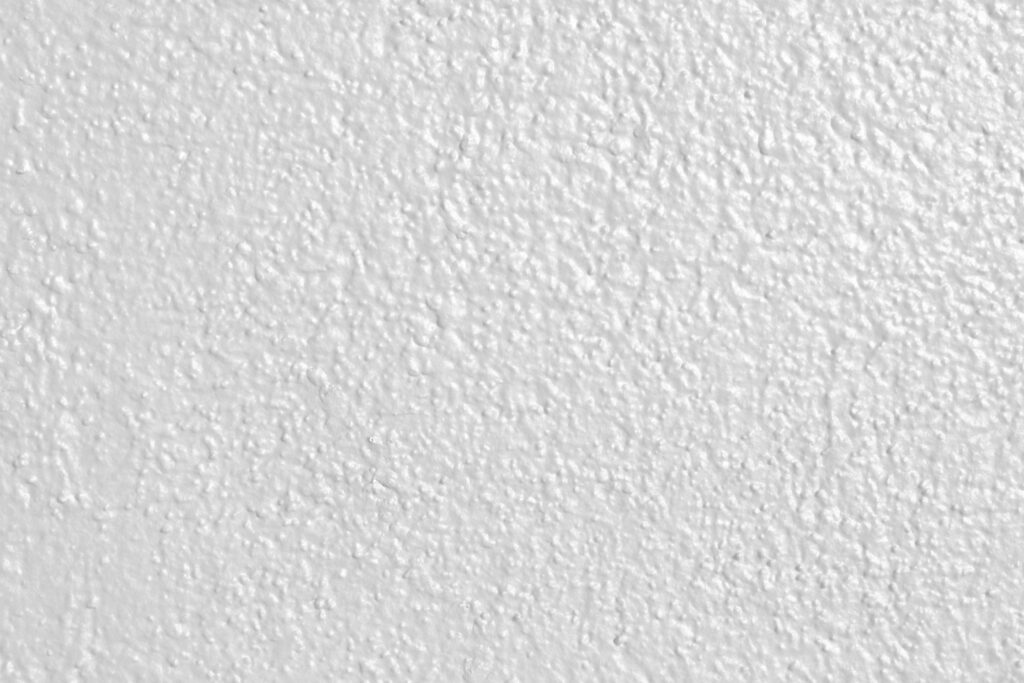 Minimalist White Wall: Captivating Textured Surface for Modern Interiors Wallpaper