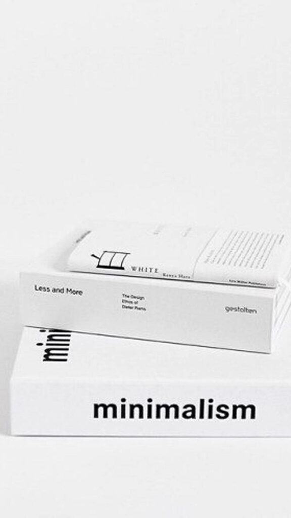 Minimalist White Wallpaper: Stack of Books on Simple Living
