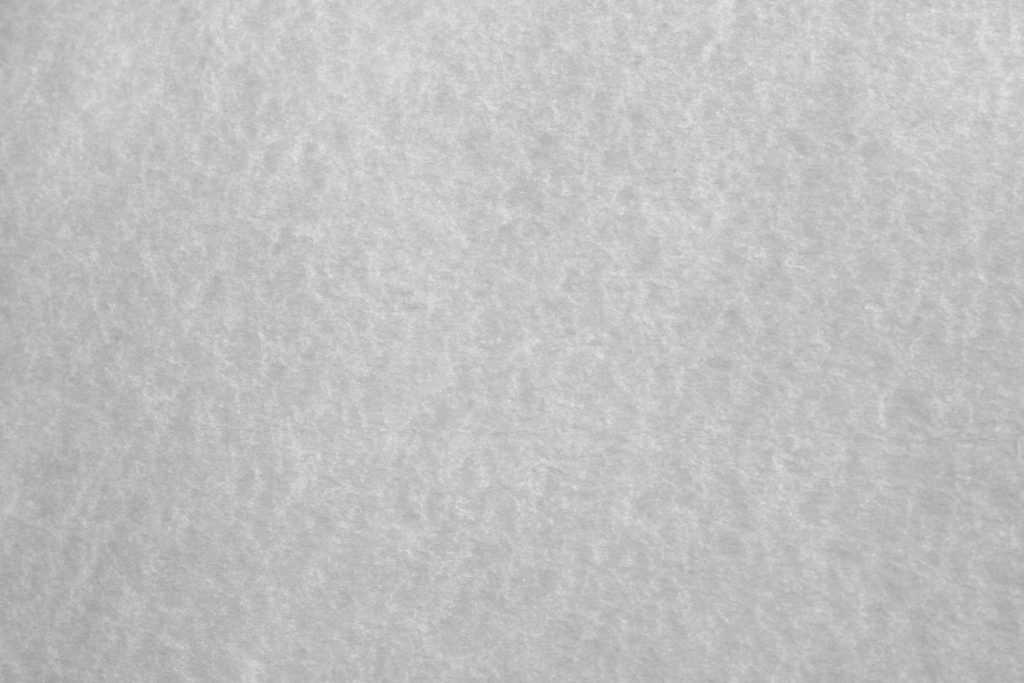Minimalist white wallpaper with subtle texture soft diffused neutral background for desktop