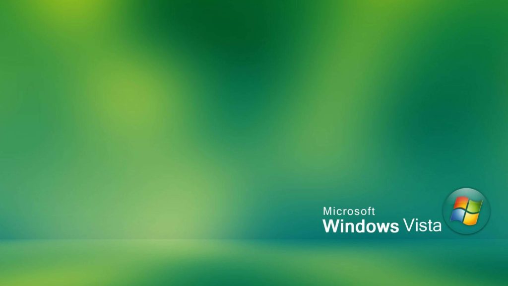 Minimalist Windows Vista wallpaper with colorful orb logo on smooth green gradient background