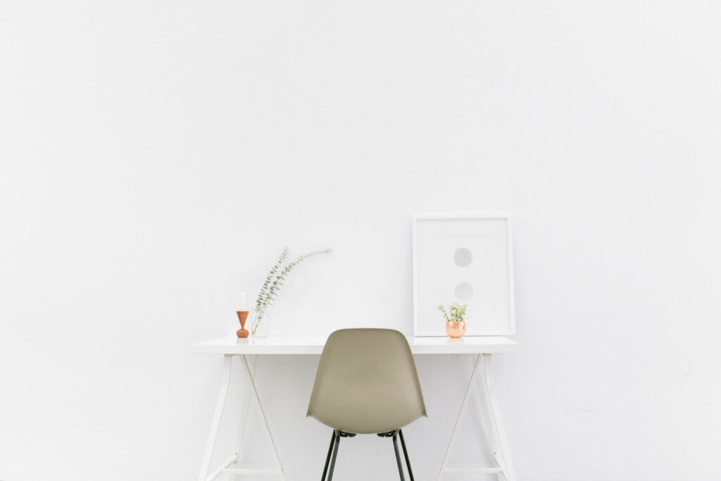 Minimalist Workspace Wallpaper: Sleek White Desk & Simple Decor