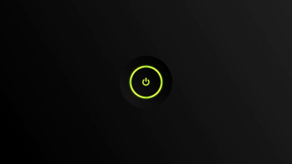 Energetic Xbox Power Button: Vibrant Green Illuminates the Dark Abyss Wallpaper
