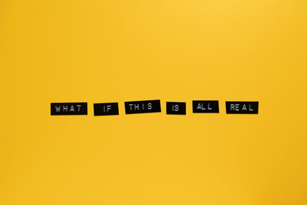 Vibrant Yellow Minimalist Wallpaper: Bold 'What If This Is All Real?'