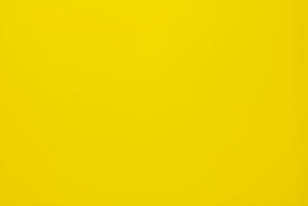 Minimalist Yellow Wallpaper: Bright & Simple Background Design