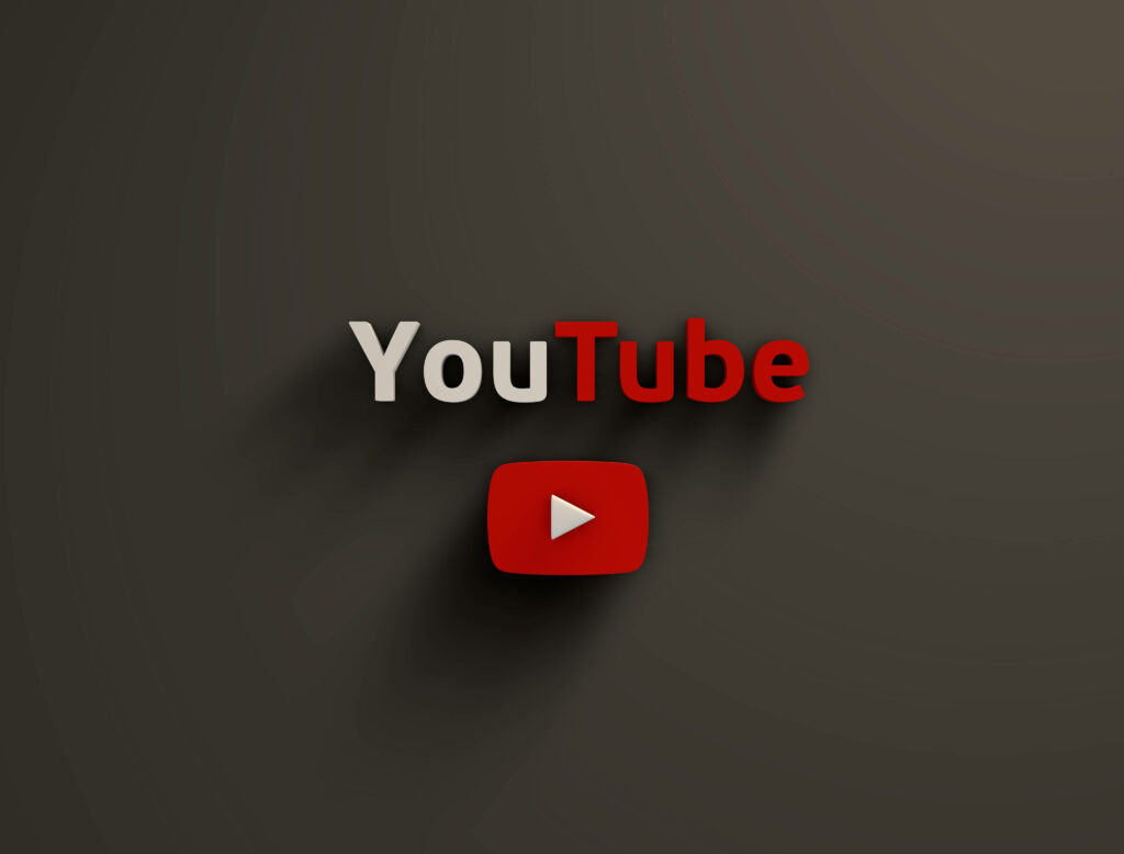 Minimalistic YouTube Logo on a Dark Gray Wallpaper