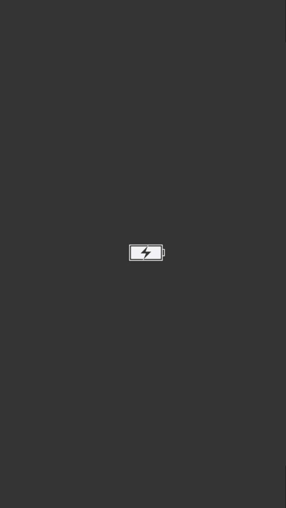 Minimalist Battery Icon Wallpaper on Dark Background for Clean Devices