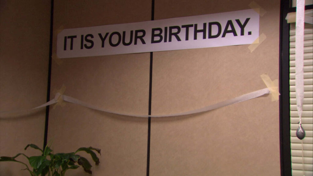 Minimalist Birthday Banner on Beige Wall: Simple Celebration Scene Wallpaper