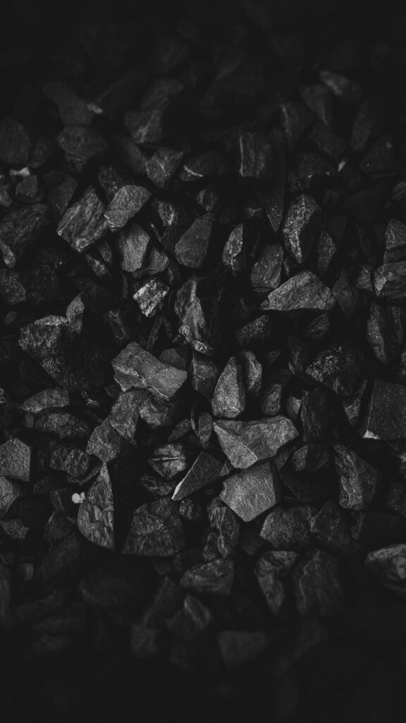 Minimalistic Wallpaper: Textured Black Stones in Dark Natural Tones