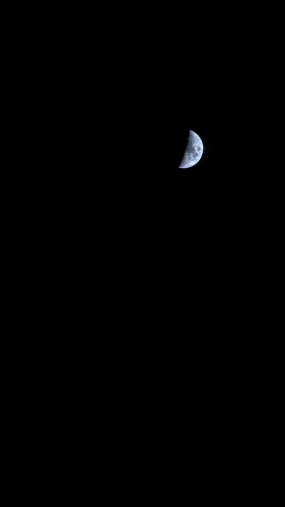 Minimalistic Crescent Moon Wallpaper: Serene Night Sky Background