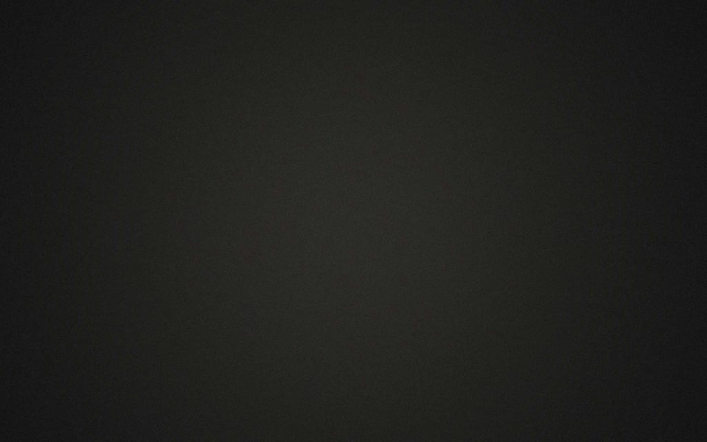 Minimalistic dark grey textured background wallpaper for a clean and professional screen look