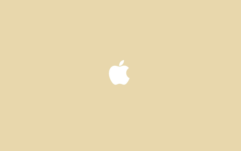 Beauty in Beige: A Serene Apple Emblem Wallpaper
