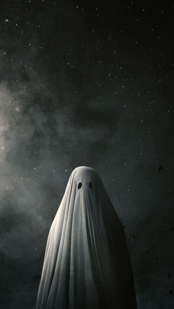 Minimalistic ghost in white blanket under starry night sky spooky mysterious wallpaper background