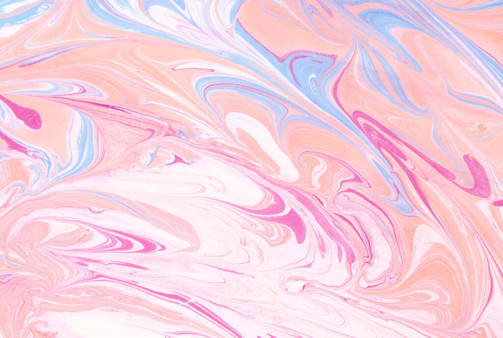 Aesthetic marble wallpaper with peach pink and blue fluid swirls for a calming desktop background