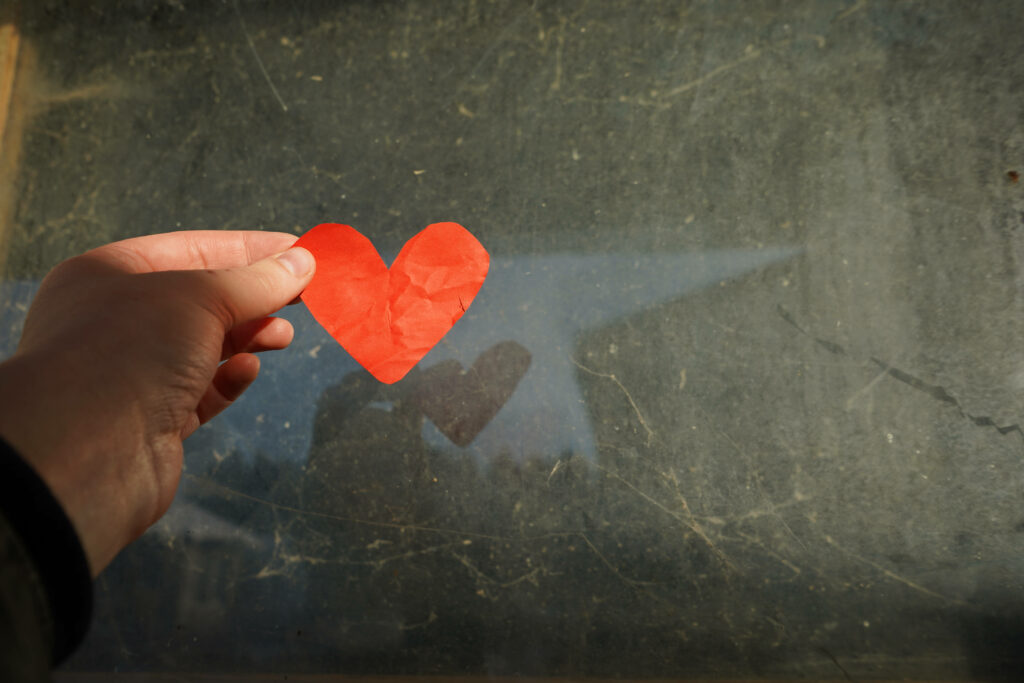 Charming Red Paper Heart on Textured Marble Wallpaper Background