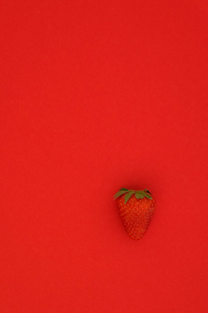 Vibrant Red Strawberry Wallpaper: Fresh & Minimalistic Background