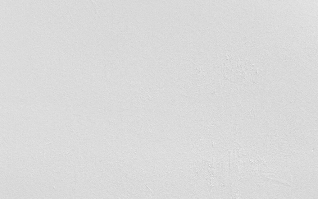 Minimalist White Wall Wallpaper: Textured Clean Aesthetic Background