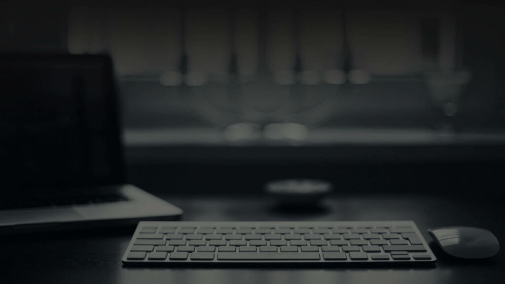 A Serene 4k Snapshot Showcases a Pristine Desktop Featuring a Laptop, Keyboard, and Mouse Wallpaper