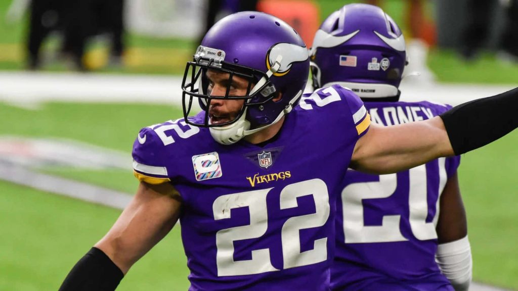 Minnesota Vikings safety Harrison Smith intense action shot in purple and gold NFL uniform Wallpaper