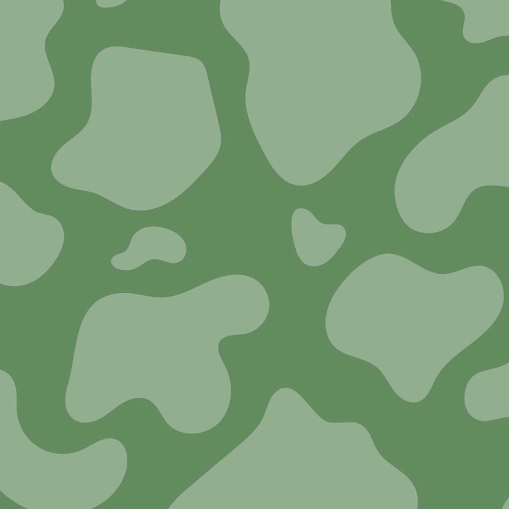 Mint green cow print wallpaper with irregular splotches on dark green background for interiors
