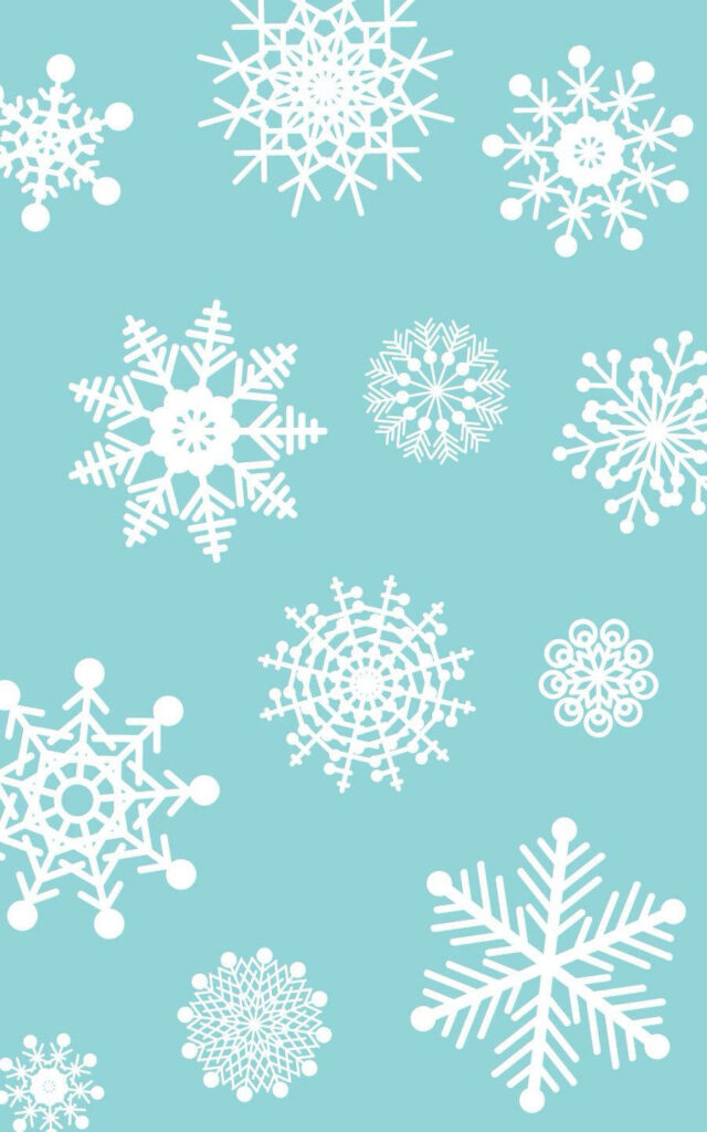 Mint Green Snowflake Wallpaper: Chic Winter Background Design